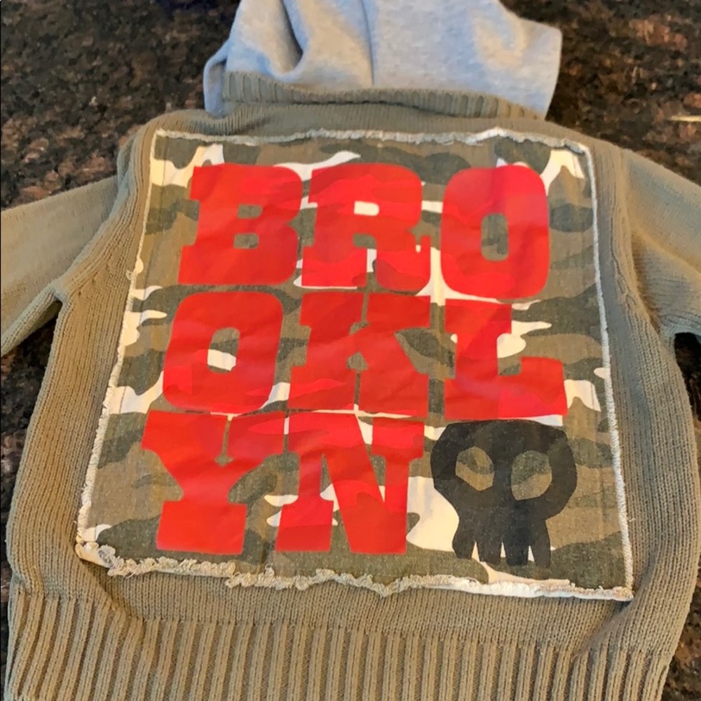 Boys Zipper up sweater with sweatshirt hood.